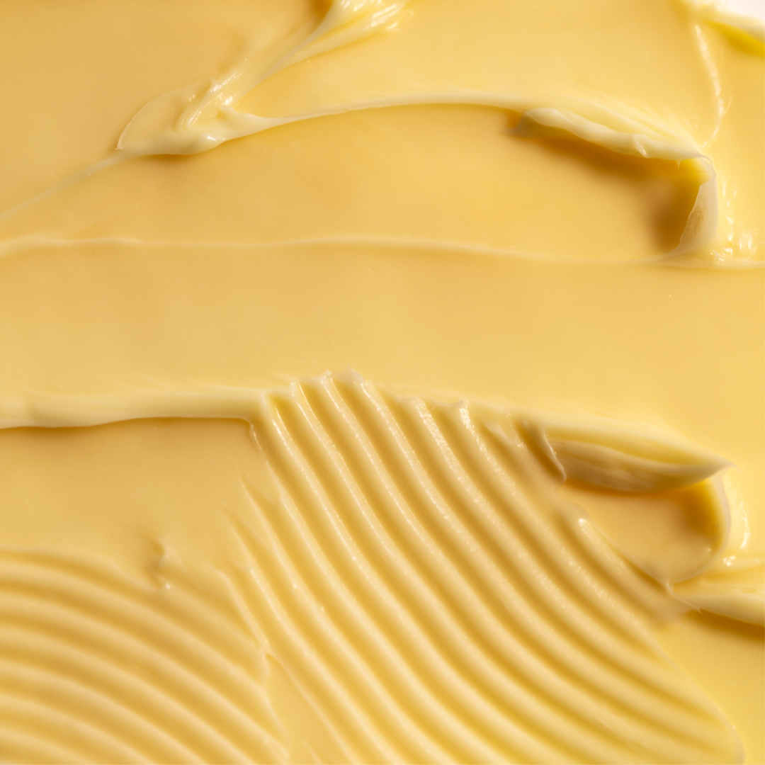 Close-up of smooth, creamy yellow texture