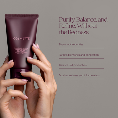 Cosmetic clarity clay mask tube held by hands with benefits outlined: targets blemishes and congestion, balances oil production, soothes redness and inflammation
