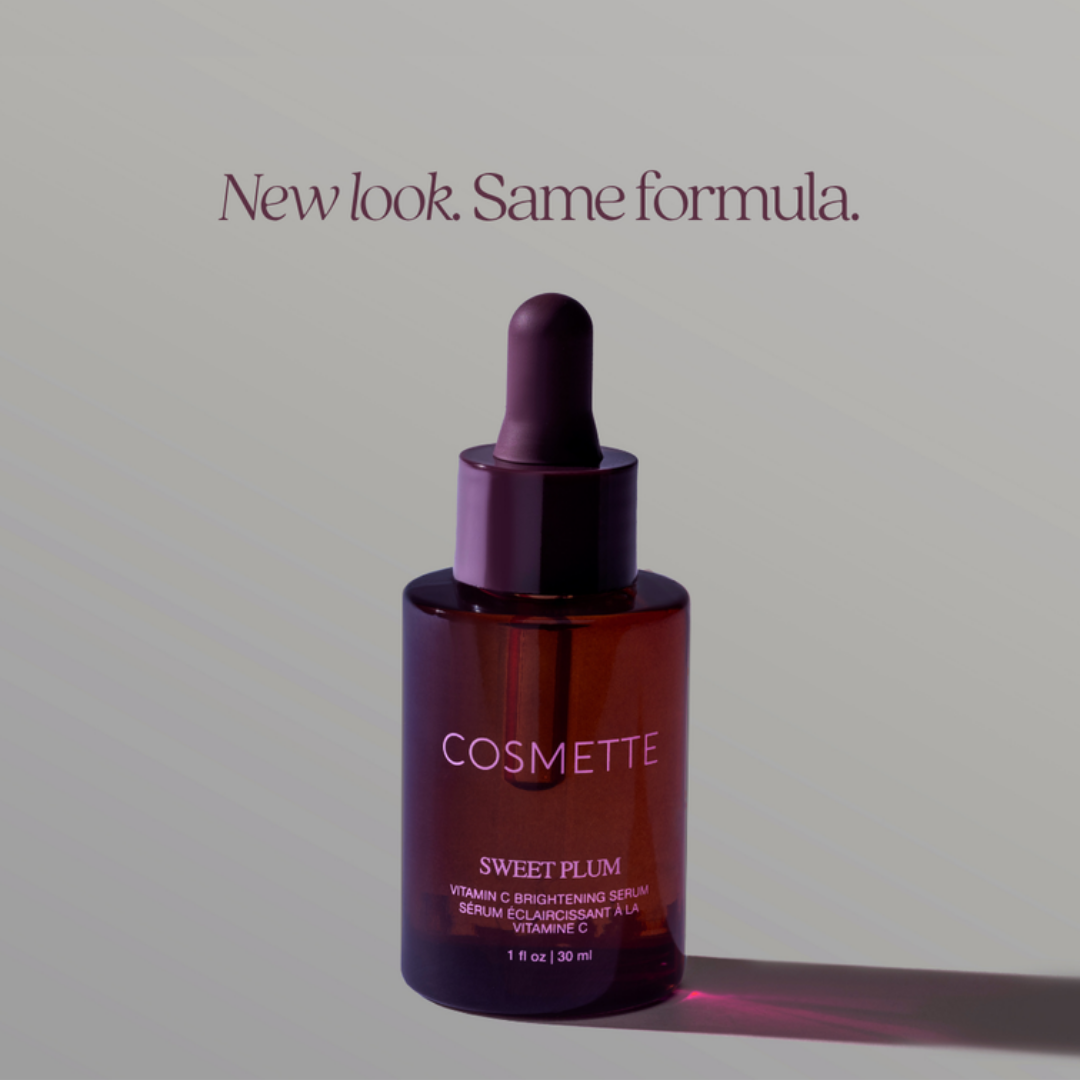 Sweet Plum Oil brightening facial oil serum bottle with dropper resting on top of the bottle