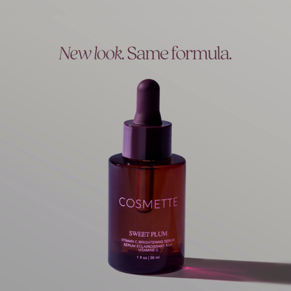Sweet Plum Oil brightening facial oil serum bottle with dropper resting on top of the bottle