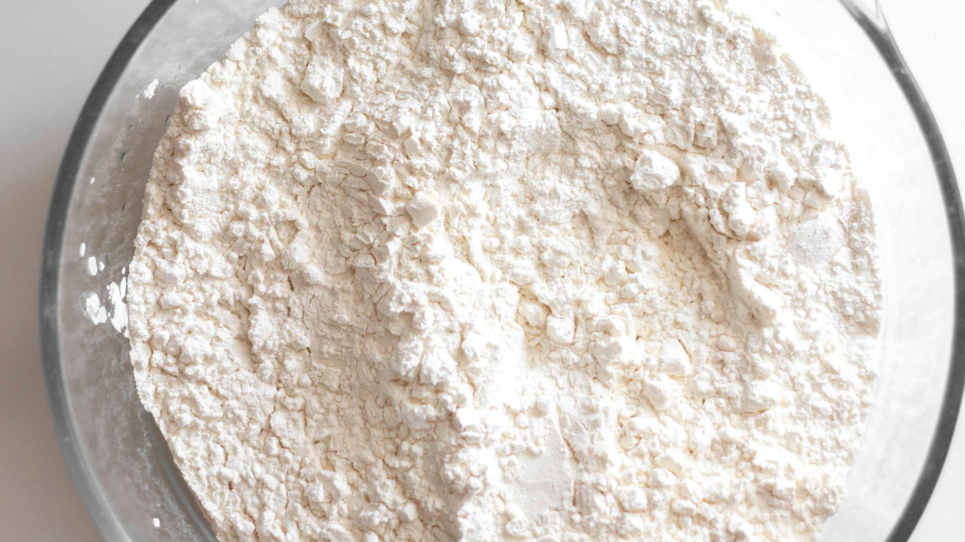 Close-up of a bowl filled with zinc PCA on a light background